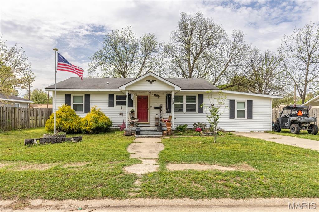 This charming 3 bedroom 2 bath home is looking of new owners, is it you?! This home has an excellent layout and has had updates over the years!  When you walk in you will see the home is a semi open concept.  The large window in the living area lets in a ton of natural light!  In the kitchen you will also find lots of cabinets for storage and counter space!  All appliances stay including the refrigerator.  On one end of the home you will find a large bathroom, large laundry room and 2 bedrooms!  On the other end you will find your primary and primary bath.  The home has a fully fenced in yard for privacy! The home is on city water but there is a well on the property for outdoor use.  Also there is new flooring in the bedroom and all of the windows have been update!  So make sure and schedule your tour today!!