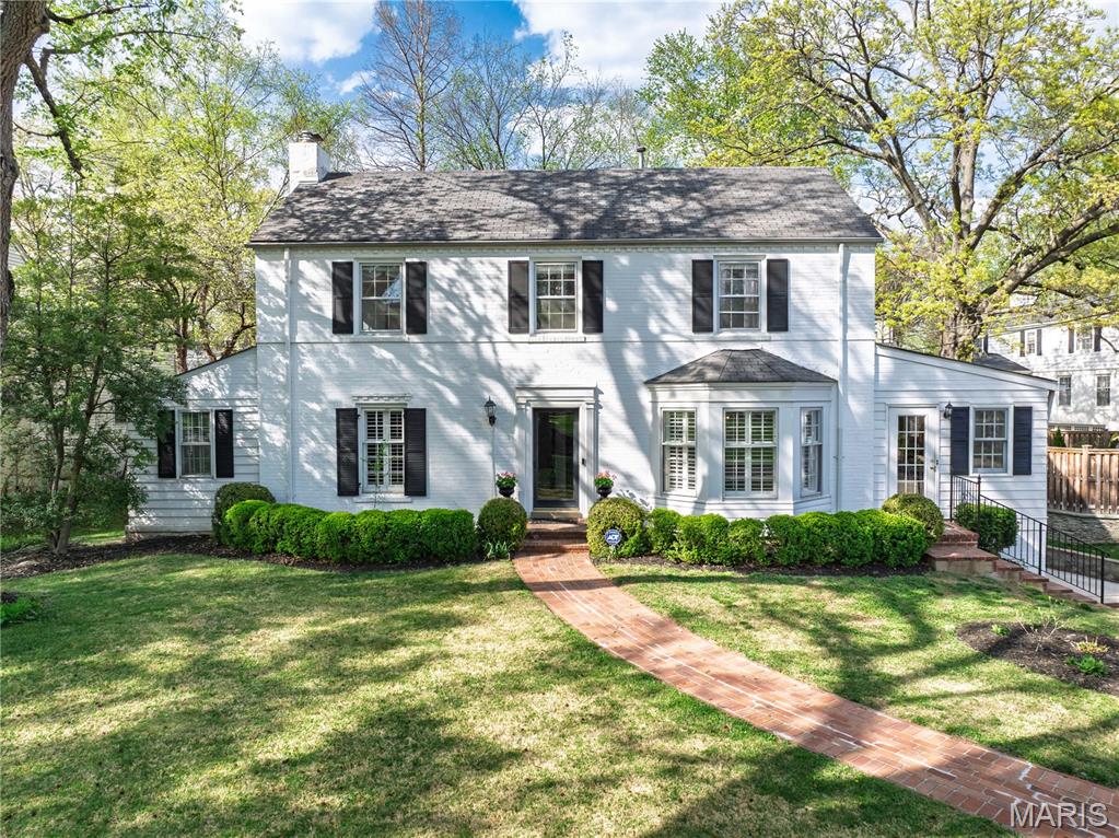 44 Willow Hill Lane is the embodiment of a storybook home from the curb appeal, to the lifestyle that emphasizes  walkability to Reed Elementary school, downtown Clayton, and the surrounding area. Set in a prime location nestled within the subdivision in a low traffic, quiet setting of this hugely popular subdivision. There is over 3,000SF on first and second levels plus an additional light filled finished space in the lower level with above grade windows that feels like main level. The highlight feature of the property is the vaulted Great Room addition on the rear of the house creating an anchor for living and entertaining, with wet bar, gas fireplace, and dual french doors walking out to the deck and back yard. The formal dining room is detailed with with bay window and the living room has a classic fireplace. A former sunroom off the living room is finished space that makes for the perfect home office.  On the second level find 4 bedrooms and two bathrooms including the primary bedroom suite outfitted with a separate tub and shower, dual vanities, and a walk-in closet. The expansive eat-in kitchen features abundant counter space, breakfast room,  granite countertops, stainless steel appliances, glass front cabinetry, and under cabinet lighting. The driveway is brand new to the property as of 2022. Lastly, Project Clear has completed all it's scheduled work in the subdivision, creating tremendous value-added for Willow Hill homeowners who will experience a water-free living environments and basements that will remain dry permanently. The Seller is offering a $15,000 credit towards a future roof replacement, with current bids available, of course, upon request.  #44 Willow Hill~ the total package!