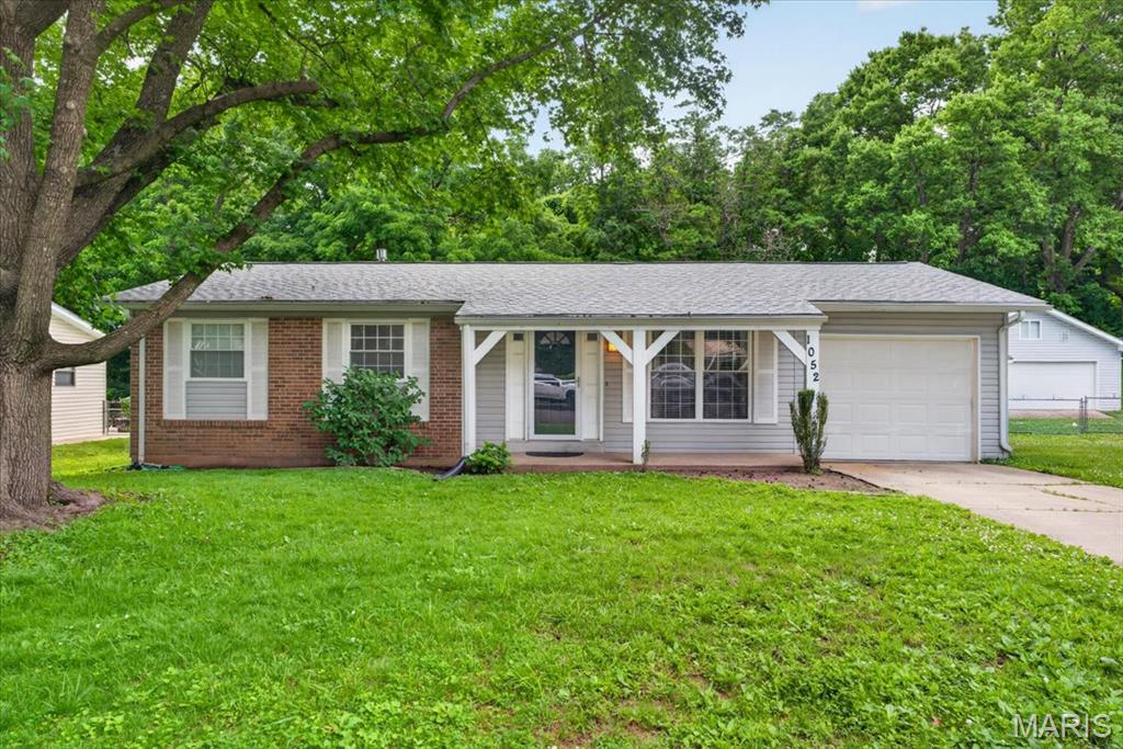 Nestled in the highly sought after Arlington Heights neighborhood, this charming 1975 built home offers a comfortable footprint situated on a 0.24 acre lot. It provides a perfect balance of indoor comfort and outdoor space. Enter through the covered front porch to a spacious family room and updated eat in kitchen with custom cabinets, tile backsplash and stainless appliances. Main floor is complete with 3 bedrooms & 2 bathrooms. The unfinished basement with sump pump provides excellent storage with potential for expansion. Backyard backs to woods offering a private setting.