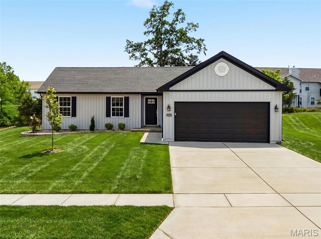 Huge savings, MOVE IN READY! New Construction by Steve Thomas Custom Homes in Westwood Farms, a new homes community in a fantastic Warrenton location!  Featuring quality construction, desirable finishes and a smart, open, floor design, this home is ready for you.  The low maintenance exterior offers fantastic curb appeal with board and batten siding on the front elevation, 30 year Tamko Titan XL 30 year architectural shingles, upgraded .44 mil siding, added width driveway, garage coach lights, full yard sod and landscaping.  Features include 3 bedrooms, 2 bathrooms, luxury vinyl plank flooring in the Kitchen-Breakfast Room-Great Room-Entry-Hallway, triple window wall in the Great Room, 36 inch white Kitchen cabinets with hardware, full overlay cabinets, soft close feature, quartz countertops, seating bar, walk in pantry, GE appliances, open stairs to the lower level, 4.25 inch baseboards, main floor laundry, luxury vinyl tile in the laundry room and bathrooms, walk in closet in the Primary Bedroom, raised height double bowl vanity in the Primary Bath, shower with semi frameless shower doors, linen closet, low E windows, 50 gallon electric water heater, electric HVAC, Tyvek house wrap, closed cell foam spray insulation at the subfloor, termite pretreatment, Watch Dog exterior foundation waterproofing and more.  The lower level has an egress window, rough in bath, sump pit and pump for an easy future finish if desired.  This conveniently located neighborhood has easy access to Highways 70 and 47, restaurants, shopping, services, recreation and more.  Westwood Farms is a tree-lined neighborhood with gentle, rolling terrain and generous spacing between the homes.  Enjoy quality construction by Steve Thomas Custom Homes, a member of the St. Louis Homebuilders Association with 35+ years of experience in the home building industry. All this home needs is you, make it yours!
