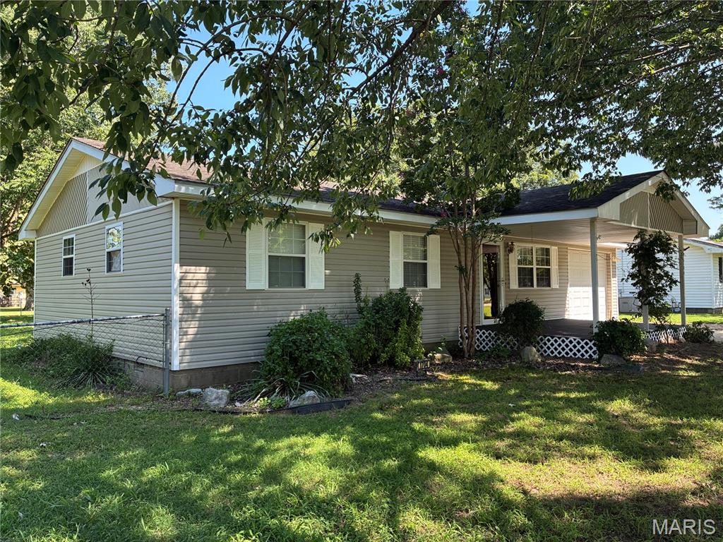 This 3 bedroom, 1 1/2 bath offers a shaded front yard and large fenced back yard. It has an eat in kitchen and laundry room/pantry, as well as an attached garage.
