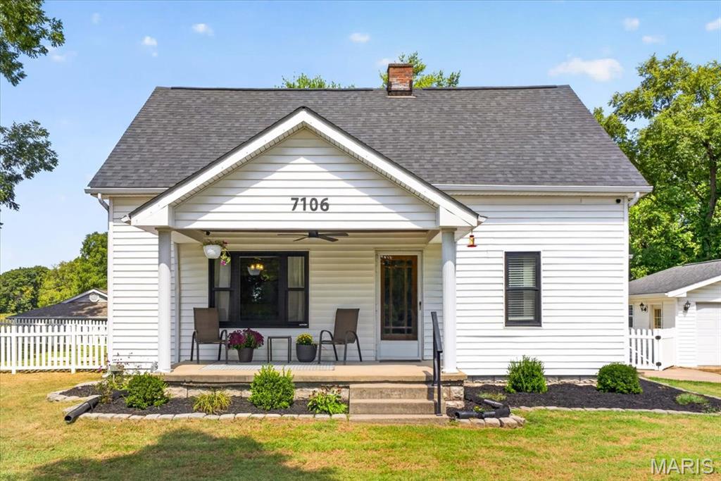 Picture Perfect Country Setting!  This completely updated 1.5 story home nestled on approximately 1/2 acre lot is just waiting for you to call HOME.  Inviting front porch and fresh landscaping are just the beginning of all this home has to offer.  As you make your way inside, you will fall in love with the NEW kitchen featuring an abundance of 42" cabinets with crown molding, ceramic tile floor and stainless steel appliances that opens to the nicely appointed dining room.  Next, make your way to the cozy living room with loads of windows allowing the natural light to grace the beautiful luxury vinyl plank flooring.  Around the corner is the main floor bedroom or office with views of the lake next door.  Before you make your way to the upper level check out the updated FULL bath with hall closet for extra storage and 2 large bedrooms with lots of closet space.  Unfinished lower level is home to the laundry area and plenty of space for all your storage needs.  Outside is your private oasis with a large covered patio overlooking the fully fenced back yard. Oversized detached two car garage has loads of space for storage and workshop area. A picture perfect location for you to Live When You Love!