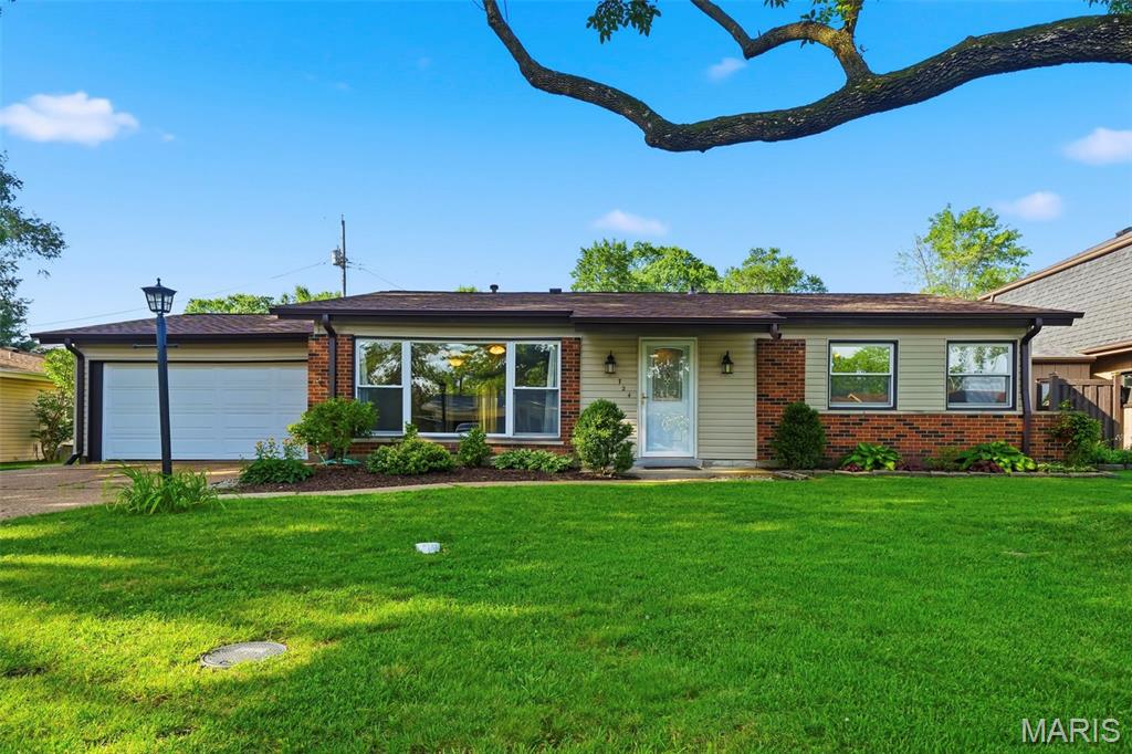 Welcome home to this charming 4-bedroom, 2-bath ranch in the Mehlville area! This slab home offers easy one-level living with an open, inviting, functional layout, and main floor laundry! The spacious primary suite features a private en suite bath and a walk-in closet, creating the perfect retreat! The bright kitchen offers an abundance of white cabinetry and a center island for additional prep or a gathering space! All appliances stay—making your move even easier. The inviting living room is filled with natural light thanks to a large picture window! Walk out from the family room to a covered patio that's perfect for relaxing or entertaining family and friends! Major updates, including a newer roof, siding, and furnace, provide added peace of mind! Conveniently located near shopping, dining, and everyday amenities, this move-in-ready home is one you won't want to miss!