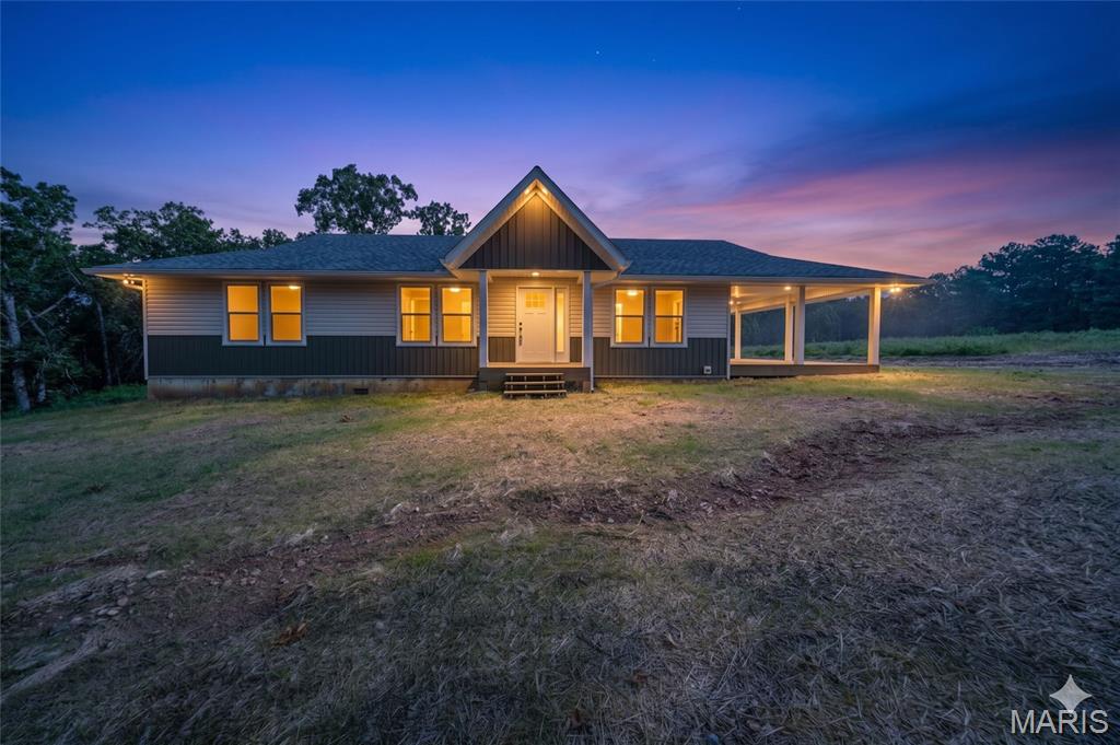 Welcome to Whispering Oaks, one of the area's newest subdivisions, conveniently located just minutes from Rolla! This newly constructed 3-bedroom, 2-bathroom home offers approximately 1,542 square feet of thoughtfully designed living space on 5 private acres m/l. The open-concept layout seamlessly connects the kitchen, dining, and living areas, creating the perfect setting for everyday living and entertaining. The kitchen is sure to impress with a large center island featuring seating, custom cabinetry, stainless steel appliances, and a spacious pantry. The private primary suite offers a large closet and a spa-like ensuite bathroom with a double vanity. Enjoy the peaceful country setting where abundant wildlife and beautiful surroundings provide the perfect place to relax while remaining just minutes from town. Seller is willing to provide a landscaping credit with an accepted offer. Don't miss your opportunity to make this stunning new home yours—schedule your private showing today!