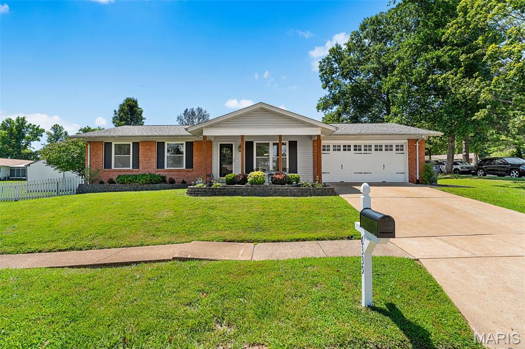 Welcome home to this darling Oakville ranch that is the perfect place to start your next chapter! This charming 3-bedroom, 2-bath home offers adorable curb appeal, a spacious corner lot, and a large, level backyard with plenty of room to relax, play, garden, or entertain. Step inside to find a bright and inviting floor plan featuring beautiful laminate flooring throughout most of the main level. The kitchen offers great functionality, and the refrigerator stays for the new homeowner! Both bathrooms have been beautifully updated, adding modern touches throughout. Need extra space? The finished lower level offers a spacious rec room plus a bonus room that could make a great possible 4th bedroom, home office, workout space, or guest area. Enjoy relaxing evenings outdoors on the cute covered patio overlooking the backyard — the perfect spot to unwind after a long day. Car enthusiasts and hobbyists will love the extra-deep 2-car garage measuring approximately 27 feet deep, offering plenty of space for storage, tools, or toys. Conveniently located in the sought-after Oakville School District and close to shopping, restaurants, parks, and more. Whether you’re a first-time buyer, downsizing, or looking for extra space, this adorable ranch checks all the boxes! For added peace of mind, the seller is providing a one-year Choice Ultimate home warranty at closing. This one is ready to welcome you home!