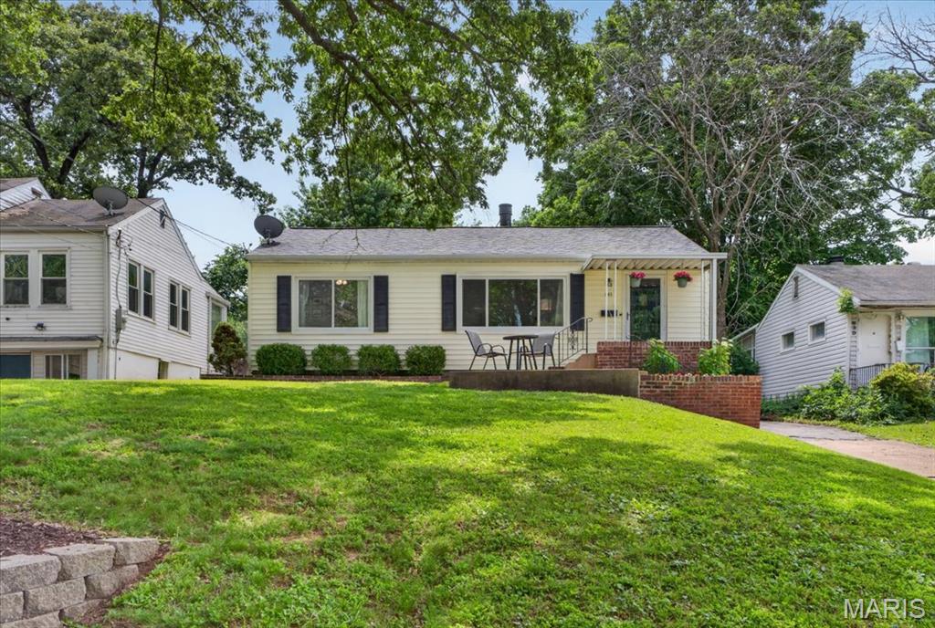 Welcome to 841 Diversey Drive — a charming 3-bedroom, 1-bath home tucked into a quiet, friendly neighborhood in the heart of Crestwood. This well-maintained home offers the perfect blend of comfort, character, and outdoor living in one of the area’s most sought-after locations. The main floor features beautiful hard wood floors and a bright, inviting living room centered around a cozy wood-burning fireplace (conveyed as-is). Downstairs, the finished lower level provides a spacious recreation area perfect for a playroom, workout space, movie nights, or additional living space. Step outside to enjoy the large, fenced backyard complete with a private patio and firepit — ideal for entertaining, gardening, relaxing evenings, or hosting family and friends. Conveniently located near Grant’s Trail, numerous parks and pools, shopping, dining, and within the highly acclaimed Lindbergh School District, this Crestwood cutie truly offers the complete package.