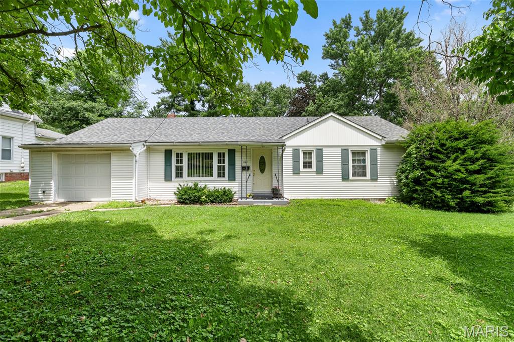 Charming 3 bedroom, 1 bathroom ranch offering approximately 1,300 square feet of living space. The spacious living room is filled with natural light from beautiful windows and provides plenty of room for relaxing or entertaining. Built in the 1950s, this home features character-filled built-ins that add warmth and charm throughout. The attached one car garage provides convenient access directly into the spacious laundry room. The roof was replaced approximately 3 to 4 years ago. Situated on an oversized corner lot, the property offers plenty of outdoor space to enjoy. The rear deck features both a covered section, perfect for relaxing rain or shine, and an open area ideal for soaking up the sun. A storage shed at the back of the property provides additional space for lawn equipment, gardening tools, and seasonal storage. Tastefully decorated throughout and move-in ready, this home includes all kitchen and laundry appliances, making your transition even easier. Don't miss your opportunity to make this charming property your own!