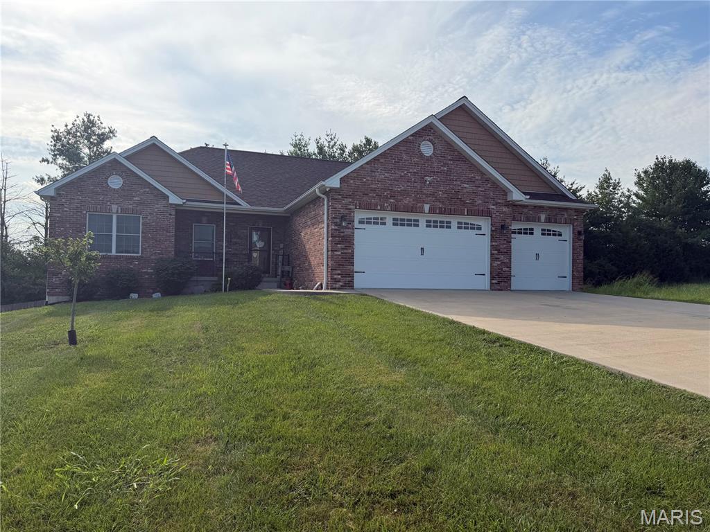 This beautiful ranch style home on a cul-de-sac has everything a family needs!  Step into the welcoming entry foyer with vaulted ceilings and you'll instantly feel right at home.  The main level features a divided bedroom plan with 3 bedrooms, 2.5 baths, upgraded counters in the kitchen including a breakfast bar, stainless appliances, double oven range, large panty and tile floor. The open concept layout is great for entertaining family and friends!  There's a half bath located conveniently just off the kitchen with easy access from the garage.  The walk-through main floor laundry is situated just off the primary bedroom/bathroom also just steps away from the garage entry.  The primary bedroom features two walk-in closets, double vanity in the bathroom and an abundance of natural lighting and storage.  The lower level features a rec room, two more bedrooms, an office, full bathroom, media room with projector and large screen, and dedicated storage space.  The mostly level front yard and fenced back yard are great for kids and pets.  This home backs to trees for privacy and the covered deck offer the perfect combination for relaxing and entertaining with family and friends.  Gateway Fiber internet service available at this address, but not yet installed.  Don't miss out on everything this one has to offer!