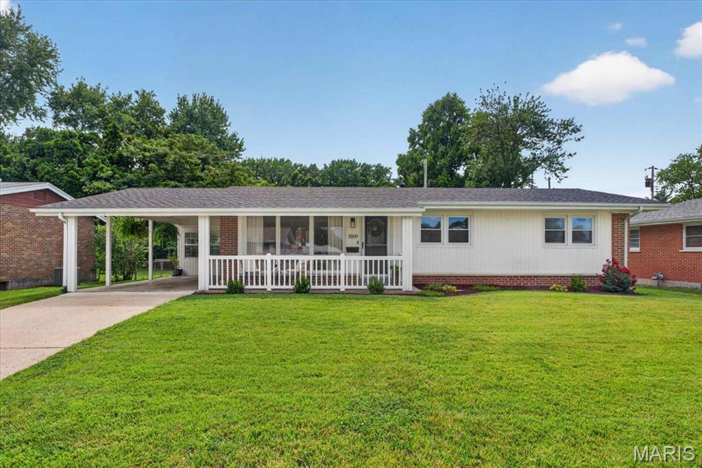 Welcome to this impeccably maintained 3-bedroom gem in the heart of St. Charles! Step inside to find gleaming hardwood floors spanning the main living areas and fresh, neutral paint top-to-bottom. The sunlit living room boasts oversized windows that flood the home with natural light, creating an open, inviting atmosphere.

At the center of the home is a stunning eat-in kitchen complete with custom cabinetry and stainless-steel appliances. Retreat to the primary suite featuring dual closets and its own private half bath. Step out into the quaint sunroom—your new favorite spot for morning coffee—or head out to the expansive, brand-new patio ready for summer BBQ hostings. With a newer architectural roof, newer windows, doors, and updated lighting throughout, all the big-ticket items are done. Unbeatable location minutes from local parks, top schools, and shopping!