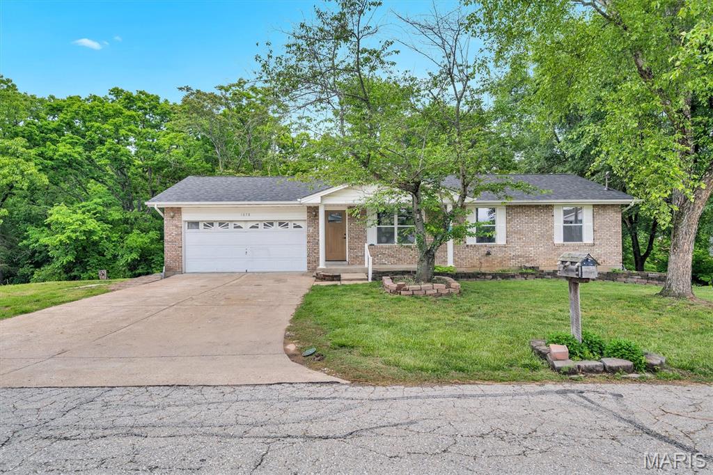 Discover a spacious 5-bedroom, 2-bath ranch-style home in the heart of Arnold, located within the highly regarded Fox C-6 School District. Set on a generous 0.34-acre lot in a quiet, established subdivision, this 1992-built residence offers a versatile single-level layout ideal for large families, multi-generational living, or dedicated home office needs. Recent updates include new countertops and new appliances, adding fresh appeal to the interior. The exterior features a durable, low-maintenance combination of brick veneer and vinyl siding, along with an attached 2-car garage for everyday convenience. A finished walk-out basement expands the living area, providing flexible space for recreation, hobbies, or storage. Positioned in a peaceful residential neighborhood yet just minutes from shopping, dining, and major commuter routes, this home offers both comfort and accessibility. Being sold as-is, it’s a great opportunity for buyers looking to personalize a home in a desirable suburban setting. Information pulled from various sources. Buyer to verify all MLS data.