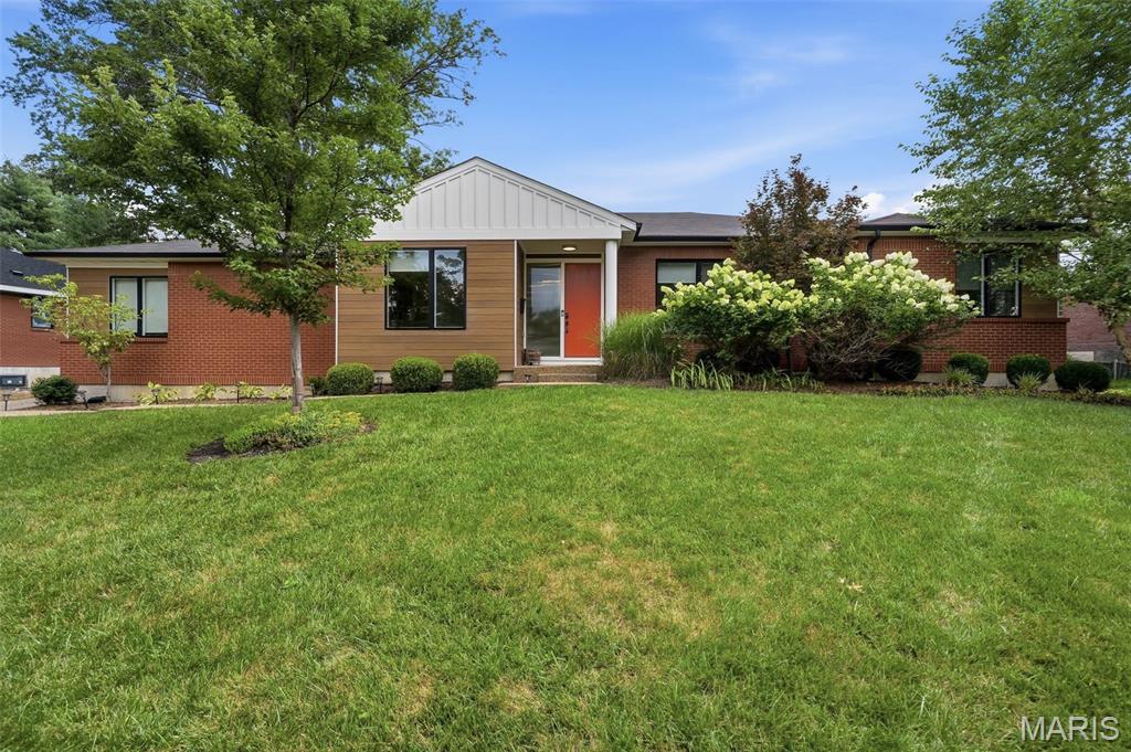 A rare opportunity in Richmond Heights and Ladue Schools! Custom built in 2018, this light-filled Ranch offers spacious main-floor living with an open-concept eat-in kitchen and living room, 3 generous bedrooms, and convenient main-floor laundry. The primary suite features a large walk-in closet, while a formal dining room and front sitting room—ideal for a home office—add flexible living space. The high-pour lower level offers an additional bedroom, full bath, and abundant storage. Outside, enjoy a private back patio surrounded by beautiful, easily maintained landscaping. An attached 2-car rear-facing garage, easy highway access, and a convenient location complete the package. An excellent condo alternative with the space and privacy of a single-family home!  Well maintained and a quality build.