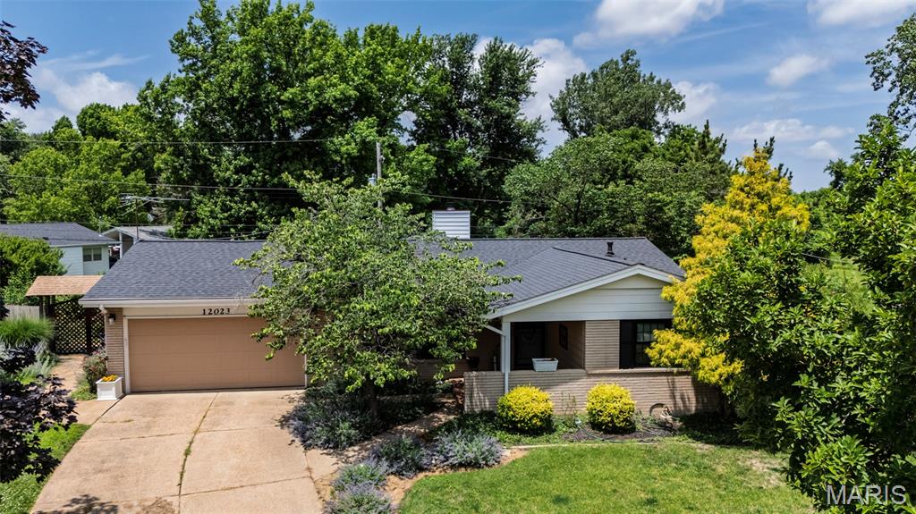 Welcome to 12023 Weshill Ct., a beautifully updated ranch in Maryland Heights and sought after Pattonville School District! Thoughtfully refreshed with updates throughout, this home features a spacious layout, including both, family and living rooms, large eat in kitchen, 3 bedrooms and 2.5 baths.
The heart of the home is the kitchen and oversized family room just off kitchen, creating an inviting gathering space filled with natural light and seamless flow, perfect for entertaining or family nights in! Step outside to the screened-in porch, where you can relax and enjoy views of the beautifully landscaped backyard. The outdoor space is truly breath taking, complete with mature landscaping, plenty of room to play or garden, and a charming chicken coop for those seeking a touch of country living.

The finished basement expands your living space with a wet bar, making it ideal for entertaining guests, hosting game nights, or enjoying family movie evenings. A versatile bonus room offers endless possibilities as a home office, fitness room, hobby space, or guest area.

With updates throughout, generous living areas, exceptional outdoor amenities, and a finished lower level packed with extra features, this home is ready to impress. Don't miss the opportunity to make 12023 Weshill your next home. Open Saturday 11-1pm.