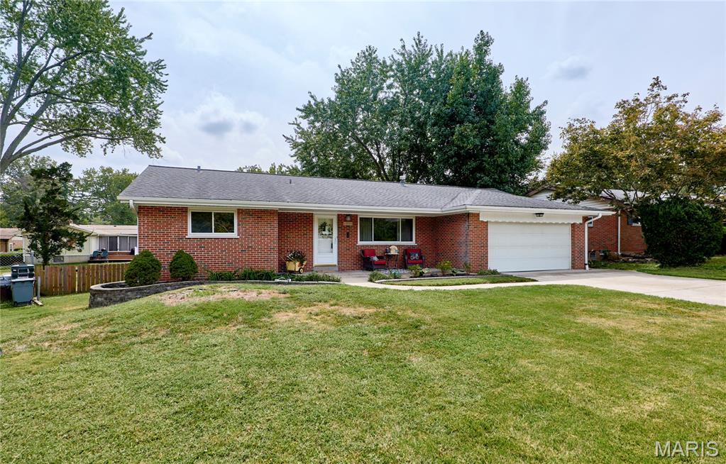 ALL OFFERS WILL BE OPEN AFTER 6;00 MONDAY Welcome to the nice City of Florissant, where one will find a great sense of community. Before entering this home one will find full brick construction, and a level lot,(almost a quarter acre) maintenance free features, including  enamel coated gutters, and soffits, and vinyl thermal windows, and of coase brick! Including is 2 car oversized garage plus a GDO with parking for 4 in the driveway.This 3+ bedroom 2.5 bath home is a true reflection of the area's timeless character.shocasing the  craftsmanship of a bygone era. Step inside to discover nice real wood floors, generously sized rooms, classic details including a family room with a beautiful fireplace, surrounded by peg/plank wood flooring. Make memories of a lifetime! Next to the family room, there is a completely new kitchen with new stainless steel appliances, quality new cabinets, new engineered floors, new built in wine cooler, topped by nice quarts countertops, with new light and plumbing fixtures. Down stairs one will see a hugh play room where the kids could have fun and the adults could find peace. Additionally, there is a nice one half bath, a den and laundry room, and generous amount of storage. There is updated 200amp electrical service, new HvAC, with improved copper plumbing. The roof is 7 years new!