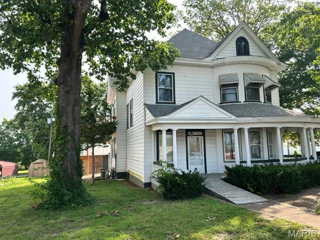 Charming 2 story Victorian home currently set up as dental office. Needs restored to be used as residential property. Great curb appeal with large porch and all city utilities.
