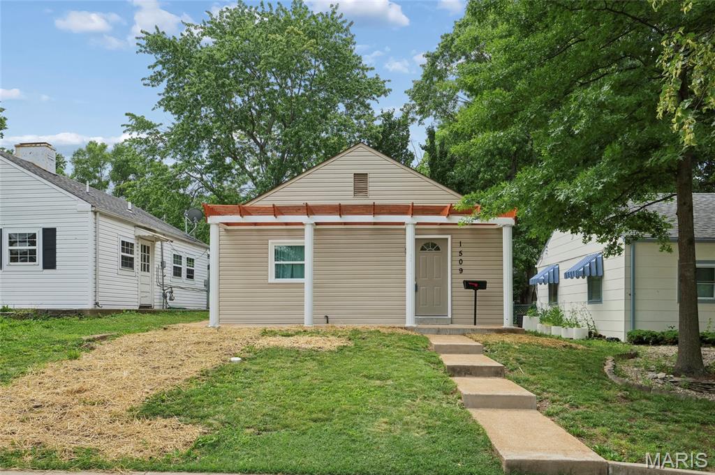 Exceptional opportunity in Dogtown/Hi-Pointe—aka the neighborhood where your social life improves simply by updating your address. This two-bedroom beauty has been completely transformed, meaning you get all the charm without any of the “what were they thinking?” design choices from previous decades. Step inside and you’re greeted by a bright, open living and dining space that basically says, “Yes, I do host now.” The kitchen is fully updated with stylish new cabinets, granite countertops, and sleek stainless steel appliances that will make even takeout look impressive. Right off the kitchen is a handy laundry/mechanical room—plus access to a massive attic, perfect for storing holiday decorations, mystery boxes you forgot you ordered, and at least one item you refuse to throw away for absolutely no reason. The bedrooms are conveniently located just beyond the living room—close enough for comfort, far enough to pretend you didn’t hear your alarm. Out back, you’ve got a spacious yard and covered patio ready for BBQs, parties, or simply standing around holding a drink while discussing how great your house is. There’s also a two-car carport accessible via the alley, because parallel parking is a personality test nobody asked for. And yes, there’s plenty of street parking on Kraft for your guests (or your future fan club). Location-wise, this place is basically showing off. You’re minutes from Forest Park with a world-class zoo, museums, golf, trails, The Muny—you name it, plus easy access to highways for a smooth commute. Want entertainment? Cardinals, Blues, concerts, and soccer matches are just down the interstate—so your weekends just booked themselves. Major hospitals are close too, but hopefully you’ll only need them for celebrating too hard after closing. Set in one of St. Louis’ most loved neighborhoods, you’ll be surrounded by great food, festivals, and enough local charm to make you wonder why you didn’t move here sooner. Bottom line: priced to sell, packed with upgrades, and possibly the best deal out there right now. Blink and someone else will buy it—so maybe don’t blink.