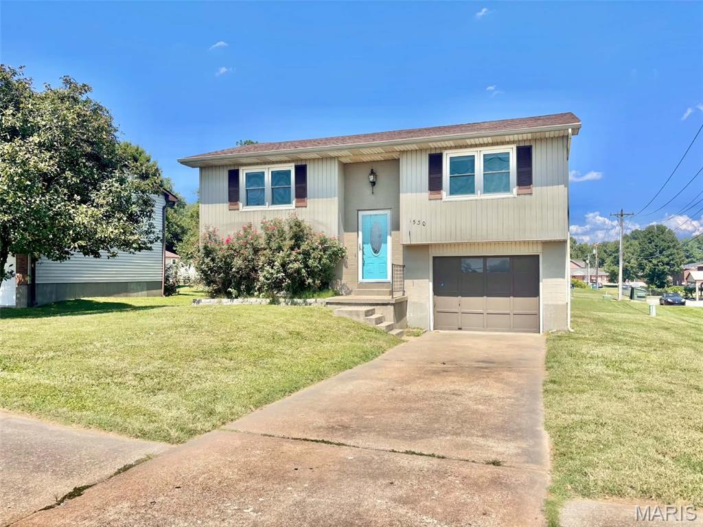 Charming & Well-Maintained Split-Level Home in Jackson!

Welcome home to 1530 Oak St in Jackson, MO! This well-maintained 3-bedroom, 1.5-bath split-level home offers comfortable living spaces, a practical layout, and a convenient location close to town and all the amenities Jackson has to offer.

Fresh paint throughout the home, including the walls and baseboards, gives the interior a clean, refreshed feel. The split-level layout provides a great separation of living and sleeping areas, with two bedrooms and a full bathroom located upstairs, while the third bedroom and convenient half bathroom are located downstairs.

Outside, you'll find a large yard with plenty of space to enjoy, entertain, garden, or simply relax. The property is conveniently located near shopping, restaurants, schools, parks, and other everyday conveniences, making it easy to get where you need to go!

This home offers a great combination of space, convenience, and move-in-ready appeal. Don't miss your opportunity to make 1530 Oak St your new home!