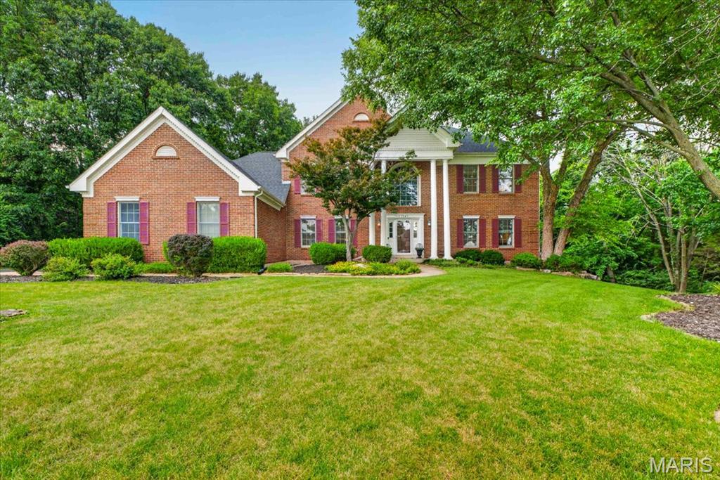 OPEN HOUSE 7/26 @1-3pm- Stunning home featuring an exceptional floor plan with generous room sizes, vaulted ceilings, open living spaces, abundant natural light, and a recently renovated gourmet kitchen.  
A grand two-story foyer showcases a sweeping staircase and curved balcony. The formal dining room and current den/office are inviting spaces, while the dramatic great room is the centerpiece, offering a full bar, built-in shelving, gas fireplace, and outstanding access to the outdoor living areas.  The gorgeous kitchen features a large island with a downdraft gas cooktop, quartz countertops, white cabinetry, stainless steel appliances (including refrigerator, double ovens, and built-in microwave), a breakfast area, built-in desk, and back staircase.  A main-floor laundry room leads to the oversized, fully drywalled three-car garage, and a beautifully updated half bath completes the main level.  
Upstairs, the sumptuous primary suite offers coffered ceilings, a large walk-in closet, and a luxurious bath with dual vanities, separate tub and shower, and a private water closet. Three additional spacious bedrooms, each with a walk-in closet, and two pristine full baths provide plenty of room for family and guests.  The finished walk-out lower level is truly a showpiece, featuring a full bar with abundant seating, a vaulted atrium-style game area with extensive built-ins for displaying memorabilia and watching the big game, plus a projection theater system that stays with the home. A full bedroom and full bath make it ideal for guests, teens, or extended family.  The sellers also installed a maintenance-free composite deck with stairs leading to the fenced backyard, covered patio, and fire pit, all backing to a beautiful stand of mature trees.  An incredible value in a spacious family home located in the award-winning Kirkwood School District, with sought-after Westchester Elementary.  Strict showing dates due to the sellers' work schedules and pet