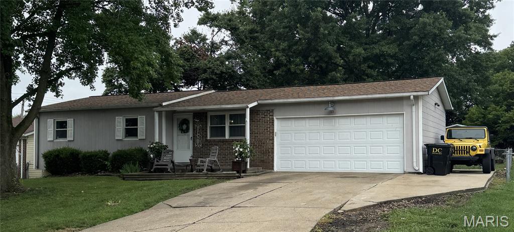 Welcome to 15 Junction Dr! Here’s your starter home that you have been waiting for without the hustle & bustle of a city street! This home has a lot to offer the minute you walk through the front door. The living room with laminate wood flooring and ceiling fan leads to the kitchen with white cabinets, pantry and sliding glass doors that lead to big, covered patio. Down the hall is the full bath with tub/shower and 2 nice bedrooms. At the end of the hall is the master bedroom with the ceiling fan and 1/2 bath. In the kitchen is the open staircase that leads to the partially finished basement with laminate wood flooring on 1 side and storage along with the laundry area on the other. with shelving. Out the sliding glass doors from the kitchen you’ll find the large, covered patio that overlooks the fenced backyard that backs to open ground. Refrigerator in kitchen, washer and dryer are all staying!