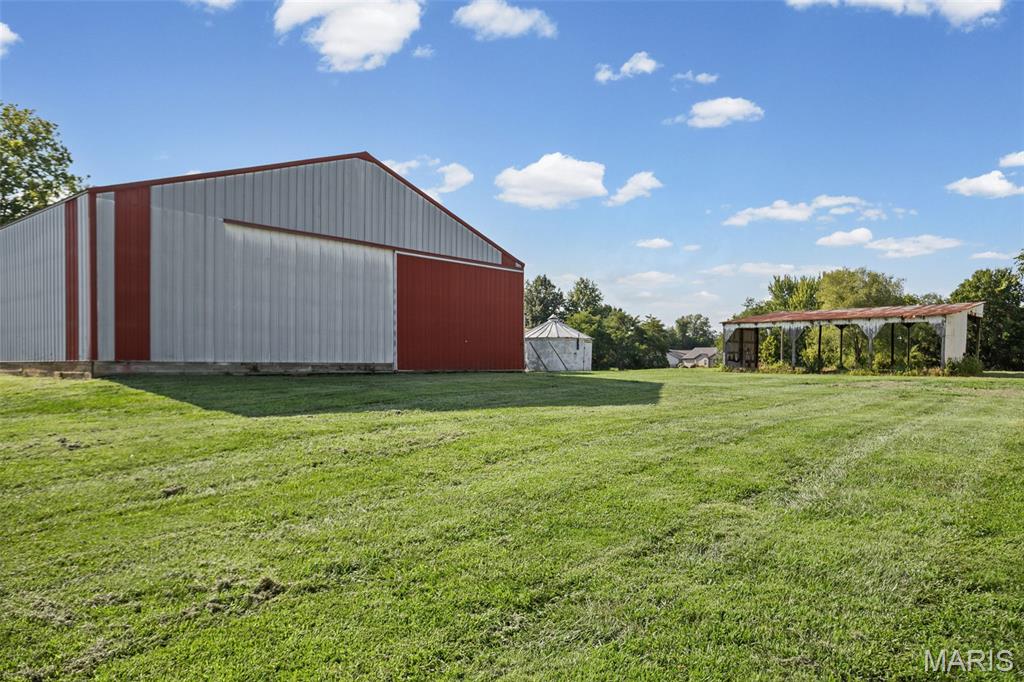Discover the perfect opportunity to build your dream home on this beautiful 7+ acre property located in the sought-after Triad School District! Offering a peaceful country setting with plenty of room to spread out, this versatile parcel features both an older barn full of character and a massive pole barn ideal for equipment, hobbies, storage, or a workshop.  Whether you're dreaming of a private homesite, hobby farm, or simply looking for extra space to enjoy the outdoors, this property offers endless possibilities in a desirable location. Don't miss your change to own a rare piece of acreage with incredible potential!  * All viewings must have a Realtor present.