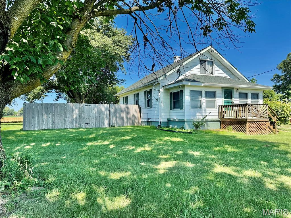 Over an acre here to love! Full main level bathroom offers a super fun clean bidet style. Don’t forget the ease and convenience of your very own laundry chute! One main level bedroom and two upper rooms or bonus room, one pass through to the next. Tile in the kitchen and YES, the appliances are staying for YOU! Office room, full basement, ample storage, walk-in closet, washer/dryer, additional kitchen flooring. Privacy fencing, chlorine pool with surrounding LED lights and patio high top table/umbrella/LED lights set. Approximately 45x37 Pole barn has its own half bath and shower kit bottom piece ready to pass to the new owner. Let’s Party - Outdoor bar and stools stay, along with the wood burning stove, fridge and carport. Previously on well water in 2020; which is still accessible should you choose. Outside city limits - Yet still close to town. Highly desired Mascoutah Schools. #GoIndians #PurplePride