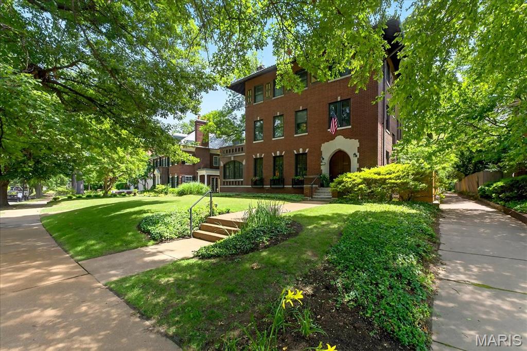 Designed by noted architect Preston J. Bradshaw, 6252 Westminster Place is the embodiment of Prairie style architecture.   Having been enjoyed and cared for with a keen sense on preservation by the same family for nearly five decades, this home is ready for a new chapter.  With its impressive brick, limestone and glazed tile facade, the interior is warm and inviting with warm wood floors, high ceilings and an abundance of natural light.  The main floor living spaces are defined, yet feel open and airy with good flow.  The back of the home plays host to the kitchen, breakfast and sunroom offering views of the lush gardens, Koi Pond and detached garage.  The 2nd and 3rd floors contain 6 bedrooms, flexible living spaces, 3 full baths and laundry.  Truly a St Louis original…not to be missed!