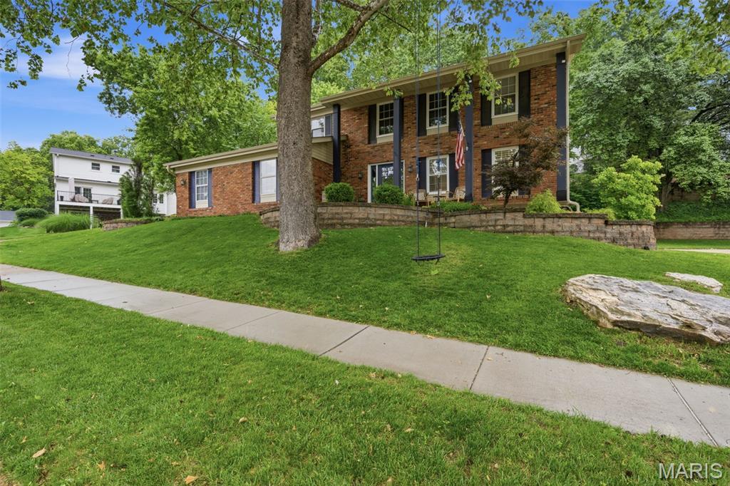 Beautifully updated and meticulously maintained, this 4-bedroom, 3.5-bath home is where everyday moments become lasting memories. Imagine watching breathtaking sunsets from the second floor, enjoying peaceful mornings in the sunroom as rain falls outside, or gathering around the outdoor wood-burning fireplace with family and friends on cool evenings.

The spacious primary suite offers a private retreat, while three additional generously sized bedrooms provide room for everyone to create a space of their own. The inviting family room features a cozy gas fireplace and flows seamlessly into the sunroom overlooking the beautifully landscaped backyard.

Outdoor living shines here, with multiple spaces designed for entertaining, game-day gatherings, family dinners, and summer celebrations. The partially finished lower level, completed in 2023, adds even more room to spread out with a bathroom, bar area, and versatile recreation space perfect for movie nights, playtime, or hosting friends.

Located in a neighborhood known for its annual Easter egg hunt, summer BBQ, Fourth of July Popsicle Parade, and Halloween festivities, this home offers more than just a place to live, it offers a true sense of community. Families will also appreciate the convenient proximity to Barrett Elementary, making walking or biking to school a part of daily life.

Major updates provide peace of mind, including HVAC (2025), roof (2024), gutters (2024), electrical panel (2023), exterior doors (2026), and dishwasher (2026). With thoughtful updates, exceptional indoor-outdoor living, and a location that encourages connection and community, this move-in-ready home is ready for its next chapter.