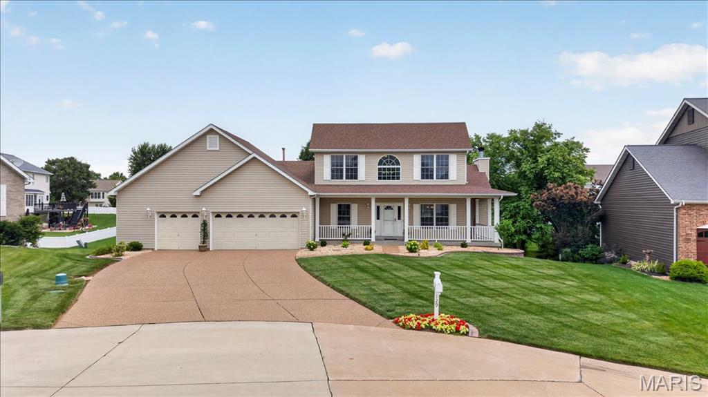Tucked away on a peaceful cul-de-sac, this exceptional 1.5-story home blends modern updates with everyday comfort. The beautifully refreshed 2025 landscaping creates instant curb appeal, while inside, a soaring vaulted great room with a cozy wood-burning fireplace offers the perfect gathering space. The completely remodeled kitchen (2025) is a standout, featuring beautiful cabinetry, quartz countertops, an unbelievable pantry, and a custom coffee bar. Brand-new blinds throughout the home (2025) provide style, privacy, and abundant natural light. The main-floor primary suite includes a walk-in closet, and private ensuite bath. Upstairs, you’ll find three additional bedrooms, and a full bath. Step outside to enjoy the new composite deck (2025), ideal for relaxing or entertaining. The oversized extra-wide 3-car garage features 10+ foot ceilings and a ceiling-mounted heater that stays with the home — perfect for hobbyists or extra storage. A finished lower level completes this well-maintained home that truly reflects pride of ownership!  BONUS: Neighborhood included 3 community pools!!!!  Showings begin at 4pm on Friday, 06/12 with the Open House.