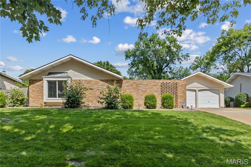 Completely reimagined from top to bottom, this beautifully updated 4-bedroom ranch offers the perfect blend of timeless character and today's modern finishes including new Anderson windows. Nestled in the heart of Ballwin's desirable Oak Tree Farm subdivision, this move-in ready home features an open, inviting floor plan designed for both everyday living and effortless entertaining.

A slate tile foyer creates a warm first impression, while luxury vinyl plank flooring extends throughout the main living areas. The beautifully renovated kitchen is the centerpiece of the home, showcasing elegant quartz countertops, stainless steel appliances, a large peninsula with seating, abundant cabinetry, and seamless flow into the main living space. Several areas of the home have been freshly painted, creating a bright, clean, and inviting feel. The spacious family room is anchored by a cozy fireplace, making it the perfect gathering space for family and friends.

Offering four generously sized bedrooms, this home provides the flexibility today's buyers are looking for—whether you need space for family, guests, or a dedicated home office. The primary suite has been thoughtfully updated with a renovated ensuite featuring a walk-in shower, updated vanity, and new flooring. The beautifully renovated hall bath showcases marble tile flooring and a marble shower surround, adding a touch of luxury for family and guests alike. A versatile bonus room provides endless possibilities and is perfect for a recreation room, playroom, home gym, hobby space, or additional storage.

Enjoy multiple outdoor living spaces designed for every occasion. A charming front courtyard patio creates the perfect setting for morning coffee, visiting with neighbors, or unwinding at the end of the day. In the backyard, the screened-in porch offers a peaceful retreat for relaxing with a book or enjoying dinner al fresco while overlooking the private backyard. An attached two-car garage, updated finishes, and quality craftsmanship throughout complete this truly turnkey home.

Ideally located in the heart of Ballwin, this exceptional home is within walking distance of Henry Elementary and offers convenient access to parks, shopping, restaurants, and award-winning Parkway West schools. Beautifully updated, exceptionally located, and completely move-in ready—this is a home you won't want to miss.