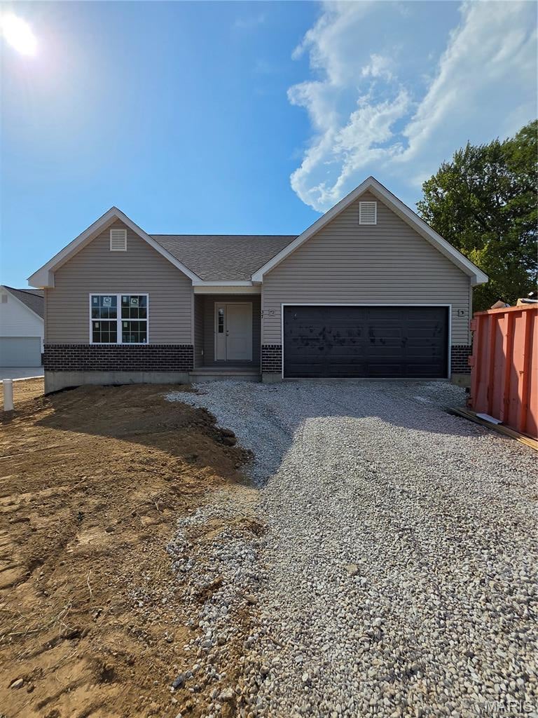 Under construction, nearing completion! Estimate completion date is October/November 2026. Interior photos are of a similar model. Outstanding opportunity to own a BRAND NEW home in Maryland Heights at an affordable price! This 3 bed, 2 bath ranch with over 1600 square feet! Lots of upgrades and premium features throughout! Some brick on front exterior.  LVP flooring running through hall, great room, kitchen, dining, and laundry! Custom kitchen cabinets with quiet close doors and drawers, granite countertops, and stainless appliances! Huge center island with bar stool seating! Separate dining space. Vaulted ceiling in great room for an open feel throughout main living areas. Primary bedroom suite boasting vaulted ceiling, large walk in closet, and private full bath with double bowl vanity. 2 panel doors, architectural roof, patio overlooking back yard, rough in bath and egress window in lower level! Just minutes from shopping, dining, schools, and easy access to highway 270 and 367!
