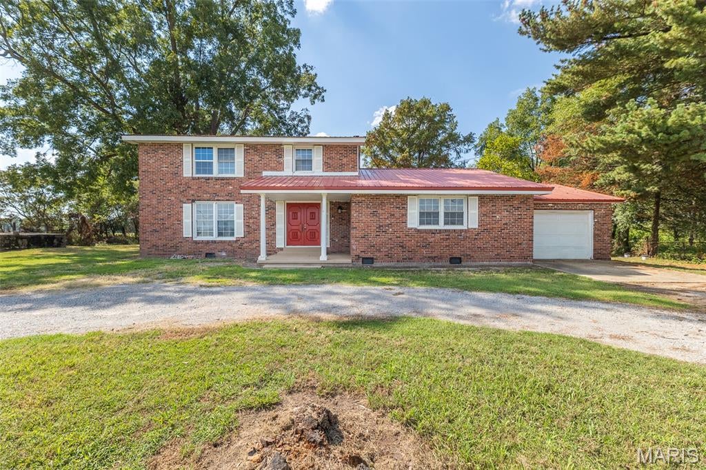 Just 2 miles from the future I-57, this beautifully renovated 5-bedroom, 3-bathroom home offers plenty of space, privacy, and room to grow. Nestled quietly on the edge of Naylor, Missouri the home has been thoughtfully updated with new showers, tubs, toilets, vanities, a new well, and hot water heater. Outside, enjoy 4.5 acres ± and a spacious 30x60 shop—perfect for hobbies, storage, or a home-based business. With its combination of modern updates, generous space, and peaceful setting, this property is ready to become your next family paradise!
