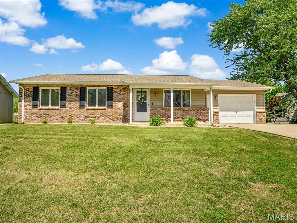 Back on the market due to no fault of the seller—don't miss your second chance at Dunlap Lake living! The perfect blend of size, location, and easy every day lake living can be found in this updated three bedroom ranch. You will feel right at home as you are welcomed inside to the open living room with fresh paint new flooring, and great natural light. The kitchen features ample work space, new appliances and open up to breakfast room. The three seasons room can be additional family room, play area, or office and  leads to beautiful backyard that is perfect place to play, entertain, or relax. Primary suite features half bath and access to backyard. Two additional bedrooms and full bath give everyone the space they need. Large lot is the perfect place to relax, play, or entertain. Oversized garage as well as shed offer great storage options or workshop opportunities. Home has dock just down the street for easy access to Dunlap lake and the lake life you have been dreaming about.  Schedule your showing today to see this great home in the heart of Edwardsville.