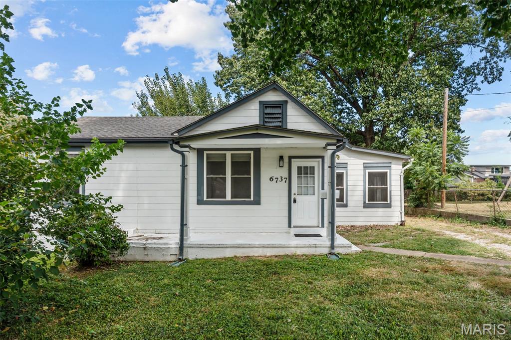 Look no further than this Lindenwood Park bungalow! Set back from the road, on a tree-lined section of Fyler, this home has feels like a private retreat in the middle of the city. Large trees shade front yard, and a covered porch leads you inside. The bright living room features hardwood floors that continue throughout the home. You'll love the charming dining room, with wood millwork, built-in divider cabinets as well as a corner cabinet with glass doors. The kitchen has newer appliances and opens to a convenient laundry room w/utility sink, plus a mud room. You'll have two spacious bedrooms, one with a walk-in closet and one with an adjoining bonus room, perfect for a home office or nursery. An updated bathroom completes the space. The backyard has a detached garage. In a great location, just steps from shops, pubs, and restaurants along Ivanhoe, as well as nearby Lindenwood Park and Tilles Park, quick access to I-44 and Downtown St. Louis, this home is one you won't want to miss! Property being sold in "as is" condition. Seller to provide passing St. Louis City occupancy. No seller financing available.