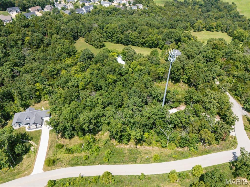 Welcome to Red Oaks Valley, where peaceful living meets everyday convenience.  This 2.68-acre wooded lot is your chance to build a truly custom home in a private, scenic setting while staying just minutes from Highways 21, 30, M, I 55, and I 270.  Large lots and beautiful natural surroundings make Red Oaks Valley stand out.  Bring your plans, your builder, and your vision.  This is the perfect place to create something extraordinary.

Available utilities:  water, sewer, gas, electric, high-speed internet, cable, and streetlights
