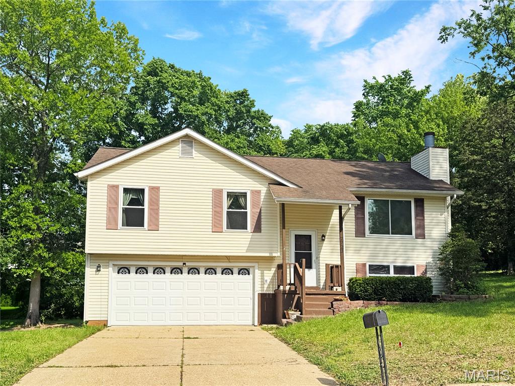 Location, Location, Location! Conveniently located near the park, college, shopping, restaurants, activities, and more, this well-maintained split-level home sits on a beautiful, large fenced lot at the end of a cul-de-sac.
Spacious great room open to the dining area and kitchen—perfect for everyday living and entertaining. Kitchen features nice stainless steel appliances, painted white cabinets, and is open to dining and living 
The main level offers a primary bedroom and primary bath, as well as two additional bedrooms and a full hall bath.  The lower level features a cozy family room with a fireplace, a half bath, a laundry/utility room, and access to the oversized 2-car tuck-under garage. Step outside to enjoy the deck, gazebo with a screen, and a 22x52 above-ground saltwater pool—ideal for summer fun. Fenced yard. New HVAC system installed in October 2024.
This home offers comfort, convenience, and great outdoor living—a must-see! Selling As IS!