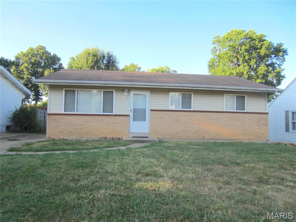 3 bedroom ranch with large back-yard, private driveway, and extra parking pad off road. Close to highway for convenience and walking distance to Larimore park, gas stations and school. Also near Spanish lake park and the new Zoo! Eat-in Kitchen has lot of wood cabinets and counter space with window over sink. Newer windows and vinyl siding on home. Enjoy a large family room w/double window. Linen closet to full bath with slate tile backsplash to shower/tub. Bedroom are all good sized with large closet space. Laundry is in lower level. 
Exit through kitchen to flat large yard with shed in place. This is being sold as-is but seller is having St. Louis occupancy inspection performed. Move right in and update over time or use as an investment property for a rental. Priced to sell.