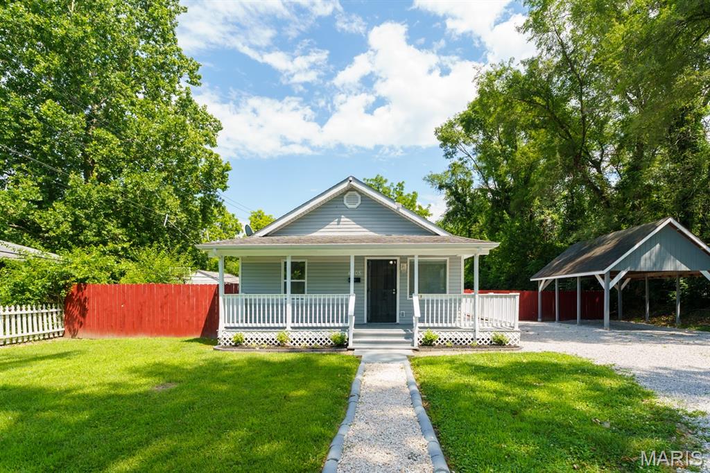 Updated residential sale opportunity at 4005 W White St in East St. Louis. This single-story ranch home offers approximately 1,250 SF of living space on a 0.22-acre lot with a clean, neutral interior, updated flooring, white trim, and a functional kitchen with owner-owned appliances included. The property features a spacious fenced yard, rear deck, storage shed, and covered parking area. Located as the last home on a dead-end street, the property offers added privacy and low through traffic. The primary bedroom also includes a loft area for additional flexible space. Ideal for an owner-occupant or investor seeking an affordable rental portfolio addition with value-add potential.