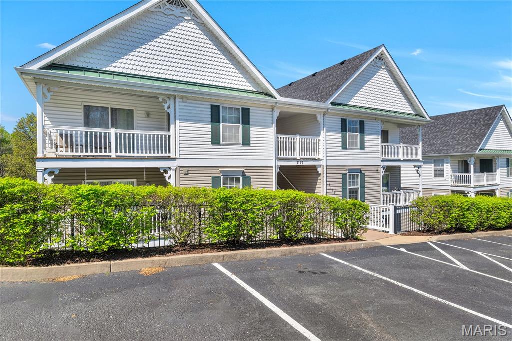 Why do we love this unit?  It's because it takes only 1 quick set of stairs to access and you still get the benefit of a top floor unit with no one living above you, best natural light, soaring vaulted ceilings, and peaceful sunrises from the kitchen and living area. Move in ready with a Carport and some of the most recent mechanical updates available in Arbor Creek, this bright and inviting condo combines elevated living with the confidence of major improvements already completed, including a NEW HVAC system and NEW water heater. The open floor plan feels spacious and welcoming, with generous living and dining areas that flow effortlessly into the kitchen featuring white cabinetry & stainless steel appliances. Sliding glass doors open to the covered deck, creating a perfect place to enjoy a cup of coffee in the morning or winding down in the evening. Inside, the home immediately stands out with attractive newer flooring throughout and a clean, updated feel that distinguishes it from many similar units in the community. The vaulted primary suite includes a walk in closet and private bath with large shower. A spacious second bedroom sits adjacent to the second full bath, offering ideal flexibility for guests, a home office, or roommate layout. Additional improvements include NEW carport and NEW ROOF. In unit laundry with washer and dryer included plus additional private storage located just off the deck. Not all of these units come with a carport but this one has it also with ample additional parking nearby. A bright, well maintained top floor condo offering stylish interior finishes and the peace of mind of major system updates already completed.