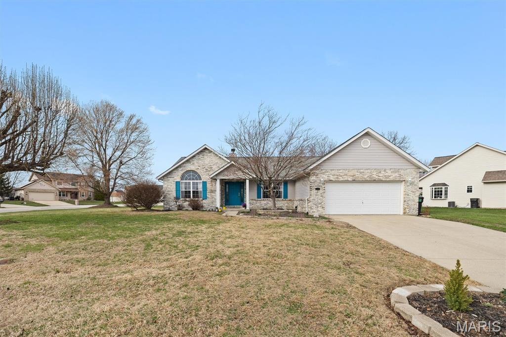 Located in the heart of Fairview Heights, this impressive 3 BR, 2.5BA ranch offers 2,200 sq ft of main-floor living on a spacious corner lot at the intersection of two cul-de-sacs. Striking curb appeal welcomes you into a large foyer that opens to a versatile office or sitting room with French doors. A separate dining room provides excellent entertaining space, while the living room features a vaulted ceiling, 10' bay window, and wood-burning fireplace. The kitchen offers abundant cabinetry, pantry, breakfast nook, convenient half bath, and sliding doors leading to a covered patio. A divided floor plan places the tranquil primary suite privately away from the secondary bedrooms, complete with a jetted tub, 48" shower, and oversized vanity. On the opposite side of the home, two well-appointed bedrooms and a refreshed hallway bathroom complete the main floor. Additionally, the home offers a main-floor laundry room for added convenience. A full unfinished basement—with egress windows and plumbing rough-ins—adds exceptional future potential for additional living space. Recent updates include a new furnace, new water heater, fresh interior and exterior paint, updated lighting in select rooms & refreshed landscaping, Located near schools, parks, Scott Air Force Base, with easy access to St. Louis, dining, and shopping. Don't miss your opportunity to own this incredible home!