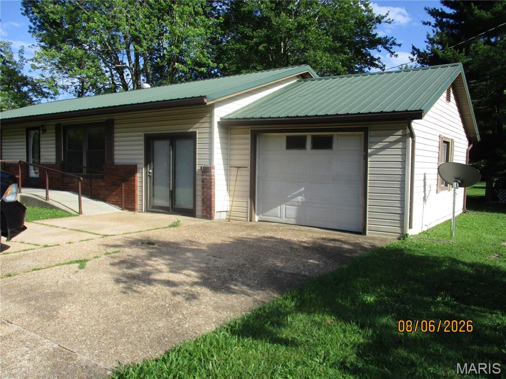 Located in Highland Terrace with Hwy P frontage is a 2-3 bedroom home with an additional lot for extra space.  1car attached garage and a 24 x 20 carport. Owners has priced to sell call for more information.