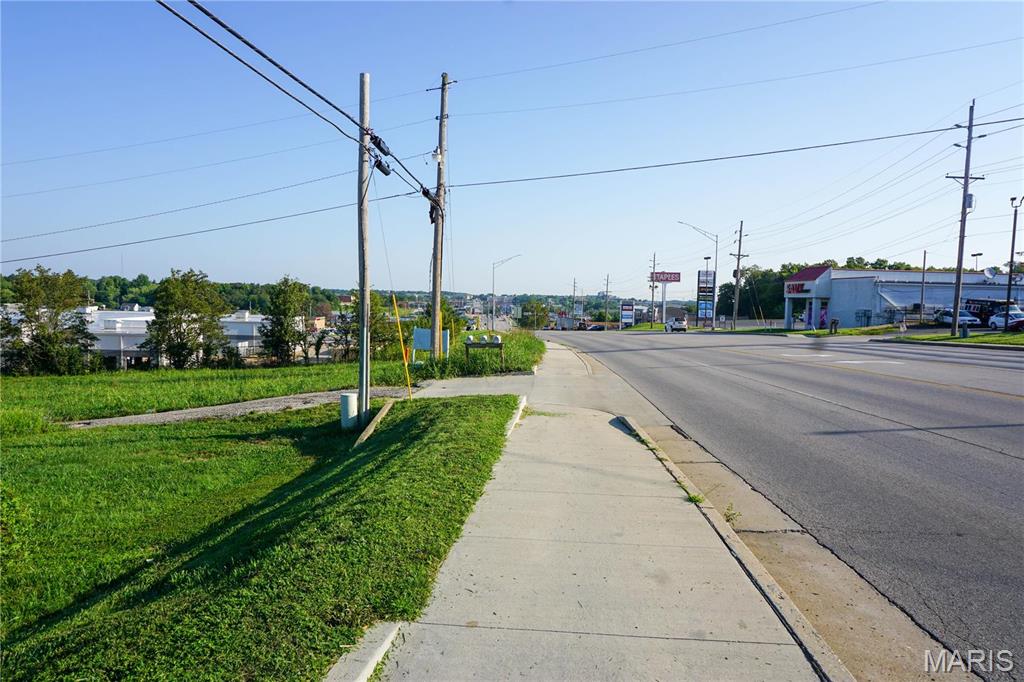 Exciting Opportunity! Discover this prime 1.952 m/l acre commercial property with excellent visibility and high-traffic frontage along Hwy 63, conveniently located near Walmart, Staples, and other major retailers. Situated at the corner of Bishop Avenue and George Street, this C-1 zoned property offers outstanding potential for retail, restaurant, office, or other commercial development. Available for sale or lease at $12,500 per month, this is a rare opportunity to secure a premier commercial location in a highly active area.