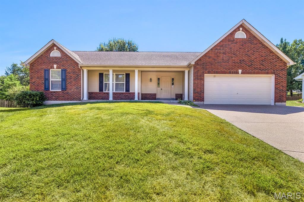 Welcome to this spacious great room ranch ideally situated on a quiet cul-de-sac featuring a handsome partial brick front with vinyl siding accents and a charming covered front porch. Inside vaulted ceilings in the great room create an open feel which flows into the breakfast room and kitchen featuring two year old carpeting and luxury vinyl plank flooring. The kitchen features new quartz countertops, lots of wood cabinetry, a pantry and a convenient main floor laundry is located just around the corner. The main floor has been freshened up with custom paint colors and brand new bedroom carpeting. The primary bedroom features a vaulted ceiling & lots of windows. New quartz counter top with double bowl sinks, luxury vinyl plank flooring, chair height commode, plus a relaxing jetted tub and separate shower in the primary bath. The nicely finished lower level adds valuable living space complete with a full bathroom, home office, recreational space or family area plus ample storage. Additional features include a two car garage and a prime location close to shopping and dining. Don't miss out on this move in ready gem and schedule your showing today! An HSA Home Warranty is also included for peace of mind.