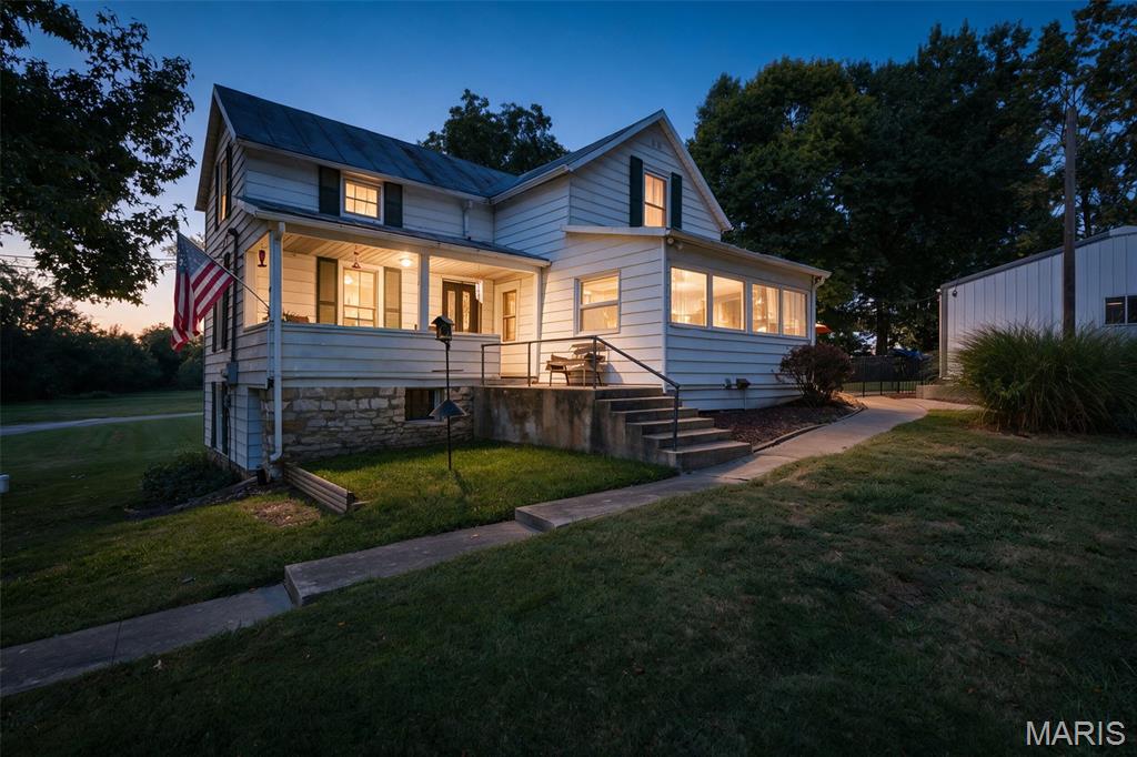 Welcome to Historic Ste Genevieve and your new home. Situation on a manicured large lot in the city is where you will find this 1.5 story home. This home features 2 bedrooms, full bath, large eat-in kitchen, living room. Enjoy the outdoors on the covered porch or the patio. Some fencing included with separate sections for the patio and yard. The detached garage/shop offers plenty of room for covered parking, workshop or turn it into an outdoor entertainment space. Conveniently located near schools, parks and the downtown Main Street shops and restaurants. Scheduled a private showing to view for yourself. This property consist of two parcels: 9705.000 house, garage, lot and 8851.000 additional 0.28 acre lot.