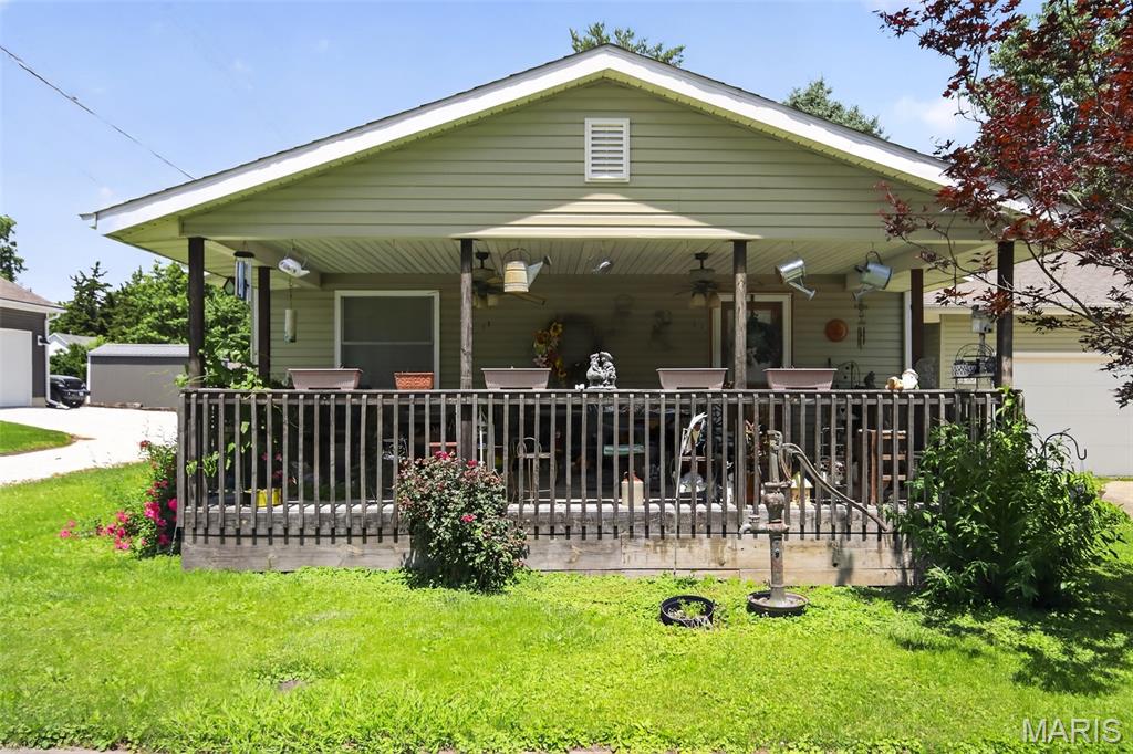 Welcome to 210 Crane St- this darling 3 bed ranch is ripe with opportunity! You are greeted by a light-filled, open-floor plan style living area, flanked by a cozy brick lined fireplace. The kitchen/dining room combo is perfect for hosting. Plenty of cabinet space and long stretches of countertops found in the kitchen will delight the chef in your family. All three main level bedrooms are generously sized. Laundry is also conveniently located on the main floor, making for an accessible ease of living. Enjoy a cup of coffee on the porch, which you have direct access to from the primary bedroom. You won't want to miss this gem! Being sold AS-IS.