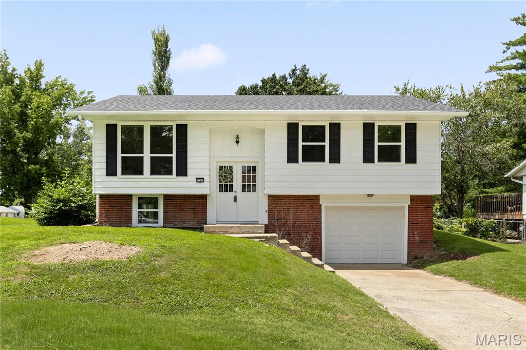 Welcome to 5702 Sir Galahad Lane in Godfrey, where every detail has been thoughtfully updated! This completely remodeled home offers the perfect blend of modern style and everyday comfort. Step inside to discover a bright, inviting interior featuring fresh finishes, updated flooring, stylish lighting, and a beautifully renovated kitchen with contemporary cabinetry, countertops, and brand new stainless appliances. The remodeled bathroom showcases quality fixtures and a clean, timeless design.
The spacious layout provides comfortable living areas,  3 bedrooms, and plenty of room to entertain or simply relax. Outside, you’ll enjoy a level backyard with space for gatherings, gardening, or play, along with a deck that’s perfect for morning coffee or evening get-togethers.
Conveniently located in a desirable Godfrey neighborhood close to Glaizebrook Park, schools, shopping, and dining, this move-in ready home offers peace of mind with its extensive updates. If you’re looking for a home where all the work has already been done, this is the one. Simply unpack and start enjoying your new home!