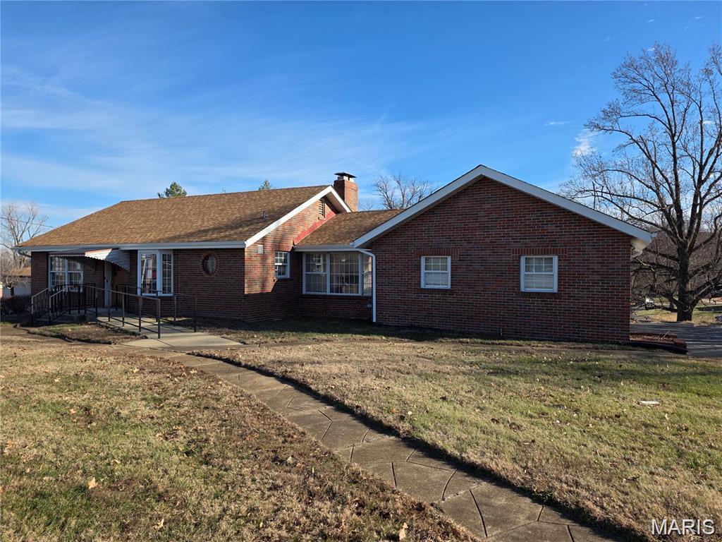 Classic brick construction, situated on a large corner lot with high-visibility frontage along Telegraph Road, this property is well-suited for professional offices or other commercial businesses. Side entry garage plus ample off-street parking for clients.