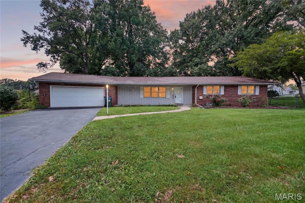 This property is a great opportunity in a well-established neighborhood! Offering 3 bedrooms & 2 1/2 baths this home sits on a great lot and offers plenty of room to make it your own. The main level features convenient laundry, and large screened in back patio.   The unfinished basement provides tons of potential for additional living, recreation, storage, or hobby space.  Oversized 2 car garage with storage space. With a little TLC the location, lot, and layout make it well worth a peek. Bring your ideas and turn this home into something special!  Property being sold AS IS.  Seller will not do any repairs.