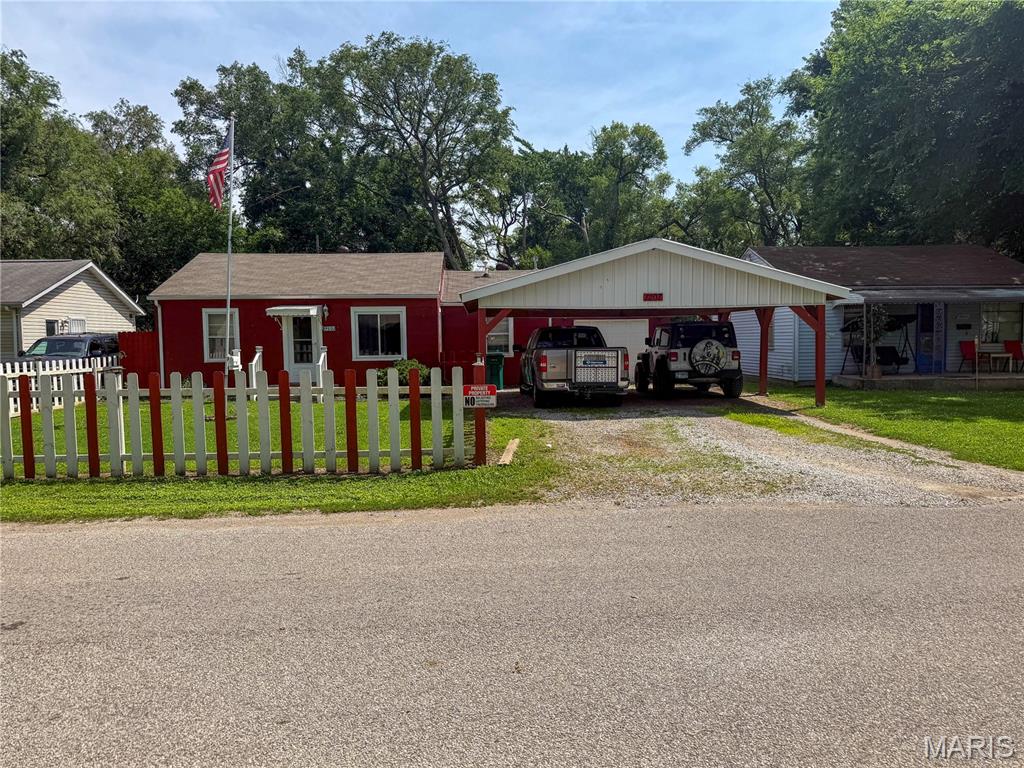 Welcome to this charming 2 bedroom, 1 bathroom home nestled in Cahokia, IL! With its inviting layout, thoughtful features, and wonderful outdoor spaces, this well-maintained property offers a comfortable and functional lifestyle that is sure to impress.
Pull up and immediately appreciate the curb appeal of this lovely home, featuring a fenced front yard, a convenient 2 car carport, and an attached 1 car garage providing plenty of parking and storage options for everyday needs.
Step inside and discover a comfortable and cheerful living room filled with great natural light, the perfect spot to relax and unwind after a long day. The well appointed kitchen is sure to please, boasting a center island perfect for meal prep and casual gatherings, along with ample cabinet storage to keep everything organized and within easy reach. The dedicated dining room provides the perfect setting for meals and entertaining, flowing seamlessly from the kitchen for easy everyday living. Two comfortable bedrooms and a full bathroom round out the interior, providing a cozy and functional layout ideal for a variety of buyers.
Step outside and discover the true gem of this property, the fully fenced backyard is a private and peaceful retreat featuring a lovely covered patio perfect for relaxing and entertaining, a convenient storage shed for all your outdoor essentials, and a beautiful rose bush that adds a touch of natural charm and color to the space!
With its functional layout, great garage and carport options, and wonderful outdoor living spaces, this home is a fantastic opportunity in Cahokia.