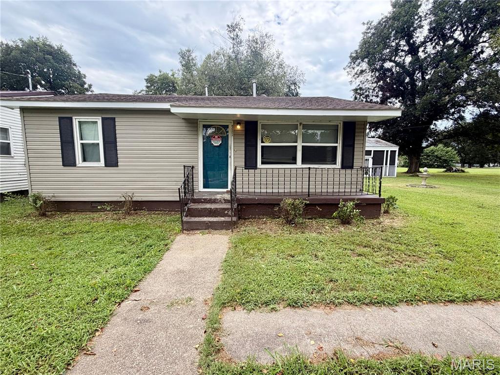 Charming and affordable 3-bedroom, 2-bath home nestled on a beautiful lot! Enjoy fresh paint as well as a newer roof and HVAC for added peace of mind. The outdoor living area is screened-in making it the perfect space for relaxing or gathering with friends and family.   Don't miss this wonderful opportunity to own a comfortable, well-maintained home.