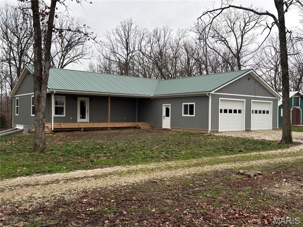 new Construction Home on 5.36+/- Acres Near Bennett Spring State Park. This newly built home offers 3 bedrooms and 1 1?2 bathrooms, and 1536sq ft of living space situated on 5.36+/- in a rural setting. An unfinished basement provides additional space for additional space or future expansion. The home features a functional layout with an open living, dining, and kitchen area designed for everyday use. the bedrooms are well-proportioned, and layout includes both a full bathroom and convenient half bath. The property offers ample outdoor space suitable for a variety of uses. with room to enjoy open land and natural surroundings. Located within a short distance from Bennett Spring State Park, the home provides access to outdoor recreation such as fishing, hiking, and nature activities. If this property fits your needs better take a look before it is gone.
