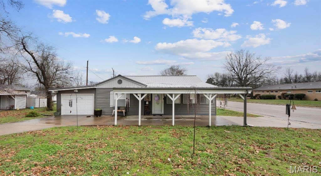 This three-bedroom, two-bath home was updated in 2024. Recent renovations include new exterior siding, kitchen and living room slide windows, and ceiling fans with dimming light options. The interior features vinyl flooring throughout, with the exception of the guest bedroom and downstairs den.

The primary bathroom has been fully updated with a tiled jetted tub/shower, quartz countertop, vessel sink, three-panel medicine cabinet, and new fixtures. The second bathroom is also new, featuring a stall shower, toilet, and vanity. In the kitchen, you will find stainless steel appliances, including a gas range with an air fryer oven, a new dishwasher, and a new sink and disposal.

Additional features include a new A/C unit installed in 2025, a metal roof, and a furnace and water heater that are approximately four years old. The property also offers a two-car garage, a carport, a fenced-in yard, and a four-year-old shed.